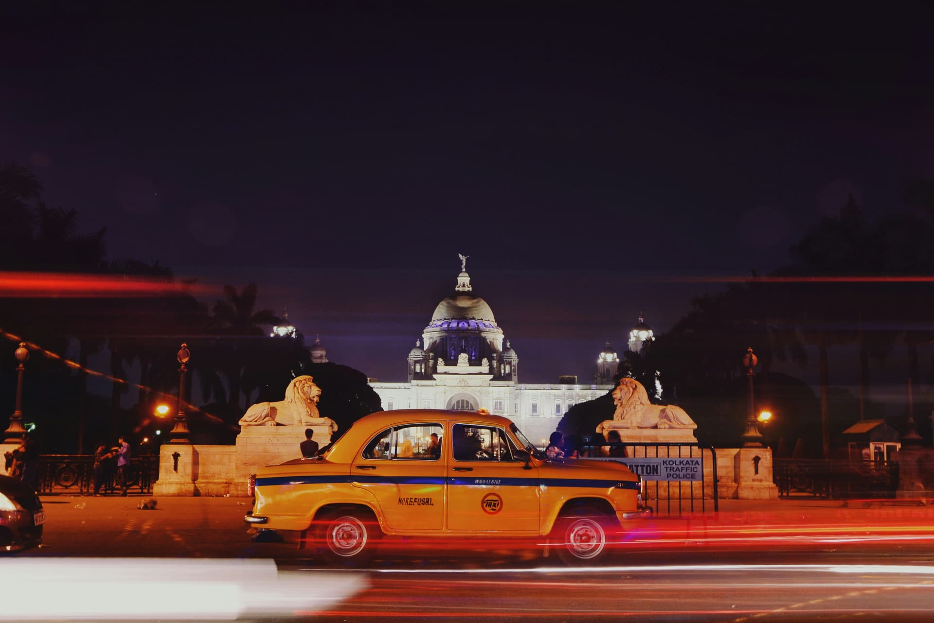 Kolkata cityscape with yellow taxi